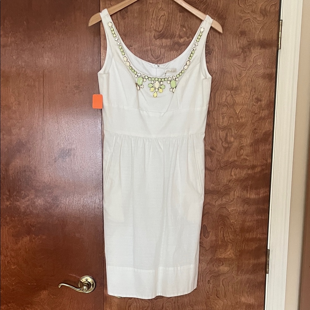 Elegant White Sleeveless Dress with Embellishments